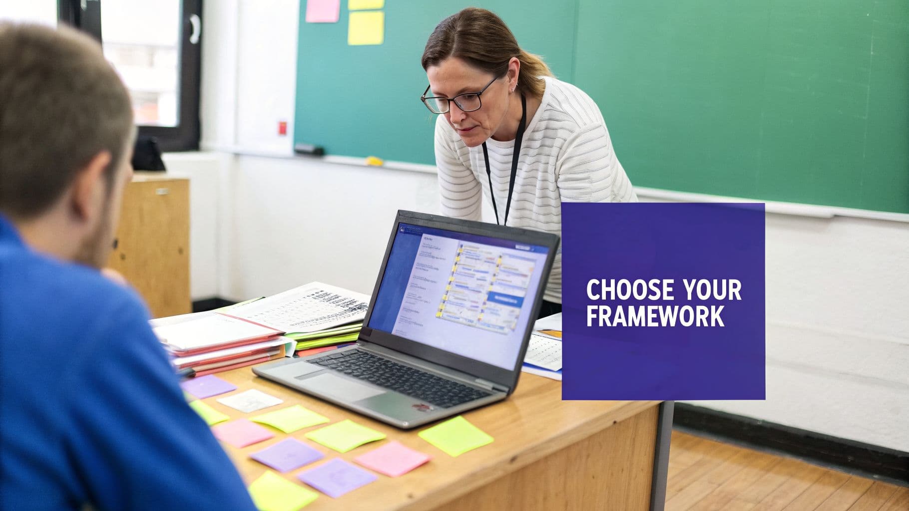 Teacher and student examining content on a laptop screen with colorful sticky notes on a wooden desk.