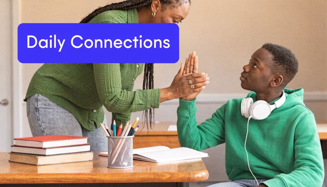A teacher high-fiving her student in a classroom as they connect during a daily study session.